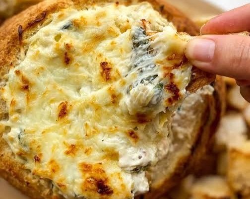 Ultimate Game Day Spinach Artichoke Dip Bread Bowl suggested serving